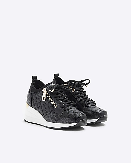 Girls black quilted wedge trainers