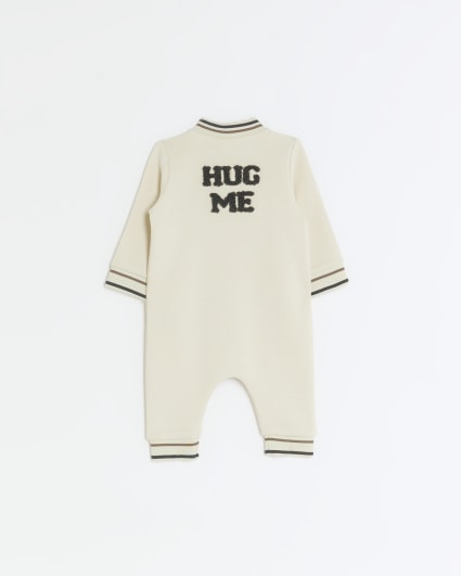 Baby cream embroidered sleepsuit