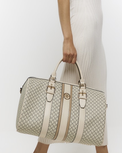 Beige RI monogram travel bag