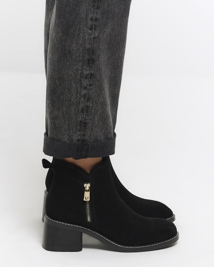 Black suede heeled ankle boots