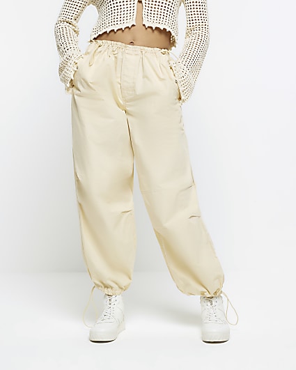 Yellow baggy low rise parachute trousers
