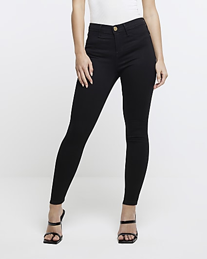 Petite black mid rise super skinny jeans