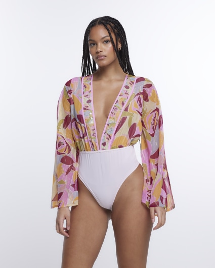 Pink printed sequin bell sleeve bodysuit