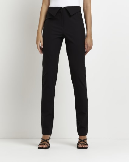 Black fold over skinny trousers