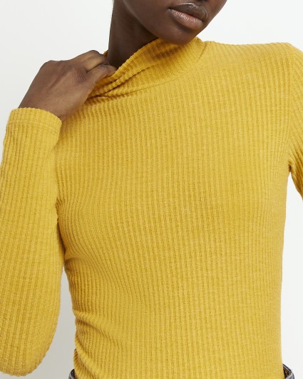 Yellow turtleneck long sleeve top