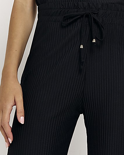 Black plisse wide leg trousers