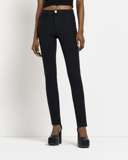 Black mid rise skinny trousers