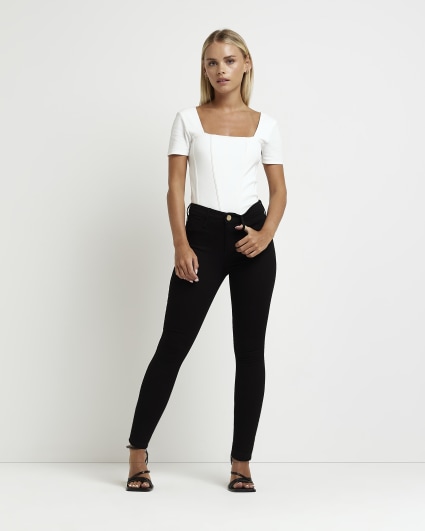 Petite black Molly mid rise skinny jeans