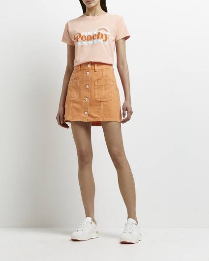 Orange denim mini skirt