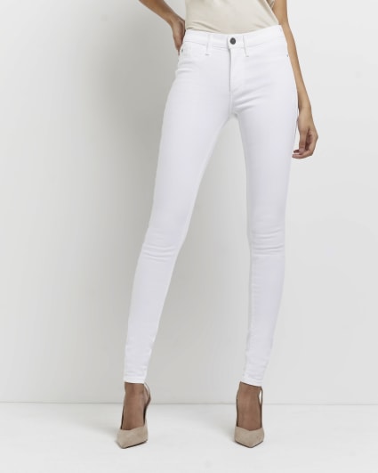 Tall white molly mid rise super skinny jeans