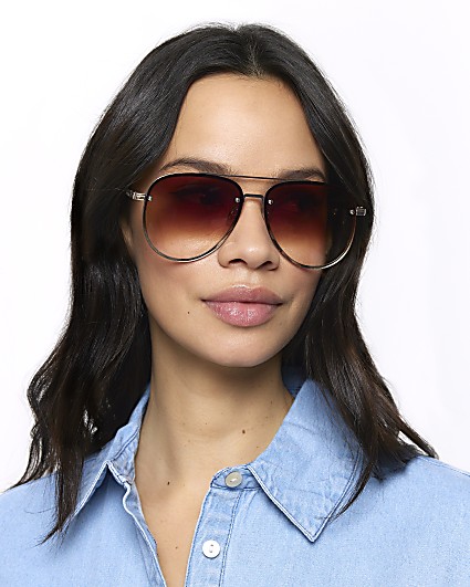 Brown rimless aviator sunglasses