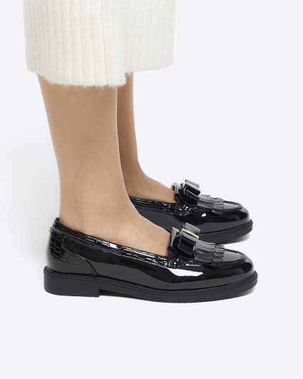 Black bow loafers