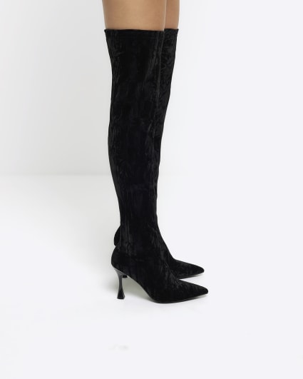 Black heeled over the knee boots