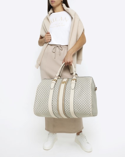 Beige RI monogram travel bag