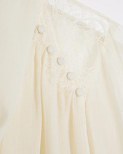 Cream lace detail flute cuff blouse