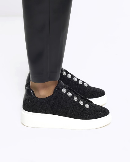 Black pearl button slip on trainers