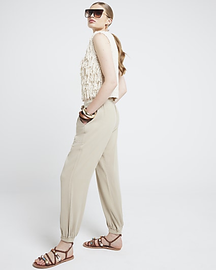 Beige crossed waistband straight trousers  Straight trousers, Tight  sweater, River island outfit