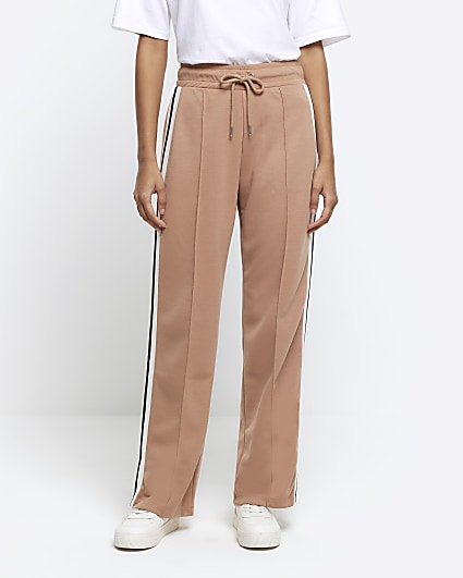 Slip-on trousers with side piping in Black