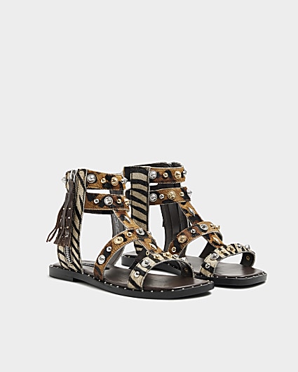 Beige leather studded gladiator sandals
