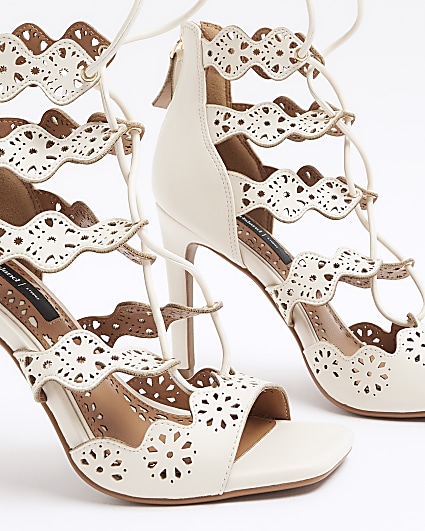 Cream cut out tie up heeled sandals