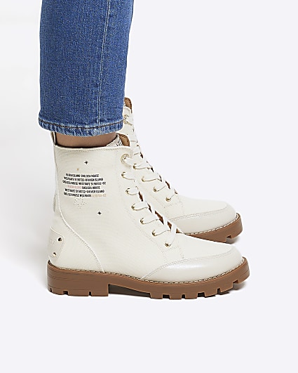 Cream lace up canvas boots