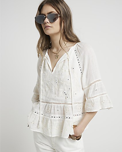 Cream embroidered floral blouse