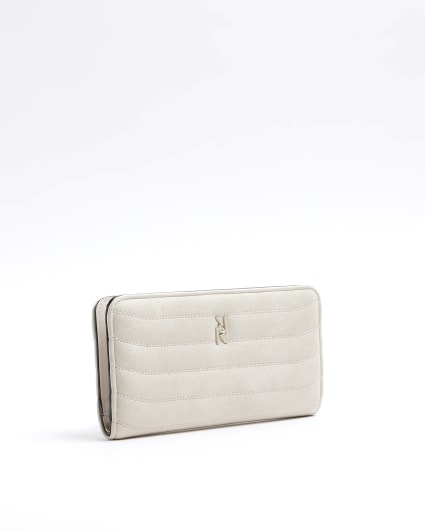 Cream quilted foldout purse