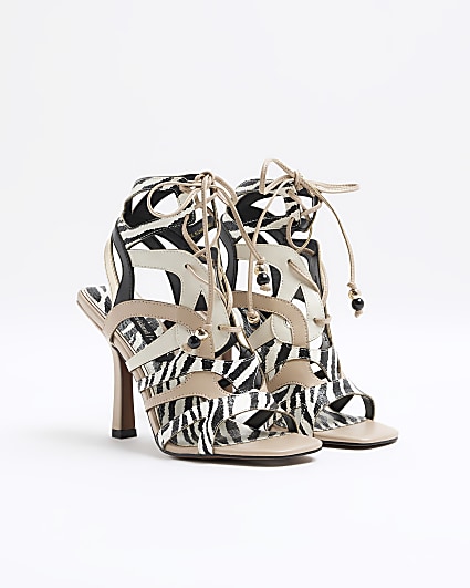 Ecru animal print caged heeled sandals