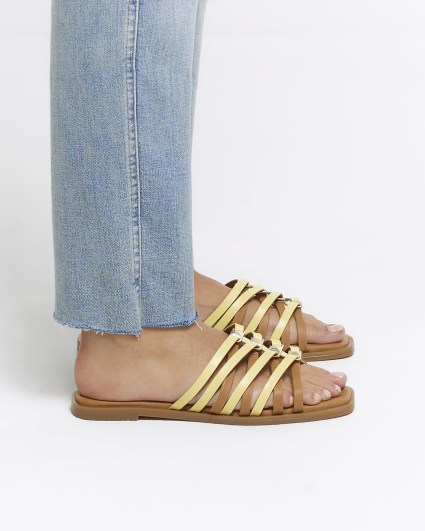 Yellow strappy flat sandals
