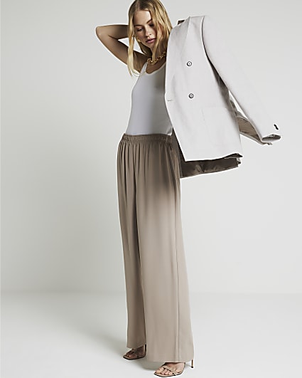 Beige crossed waistband straight trousers  Straight trousers, Tight  sweater, River island outfit