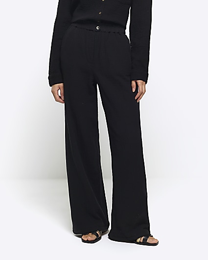 Black textured wide leg trousers