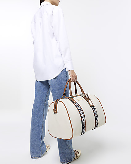 Cream canvas webbing travel bag