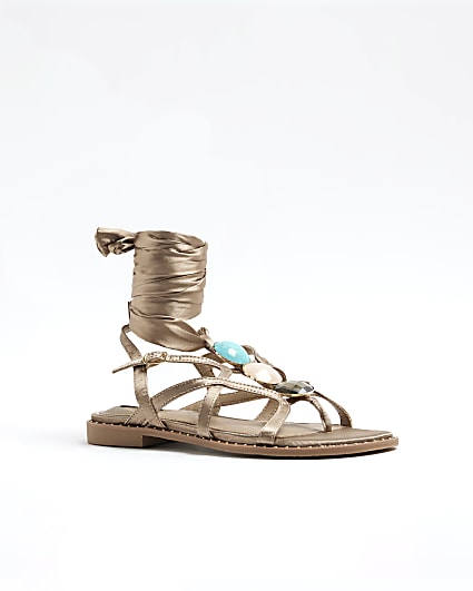 Beige embellished tie up sandals