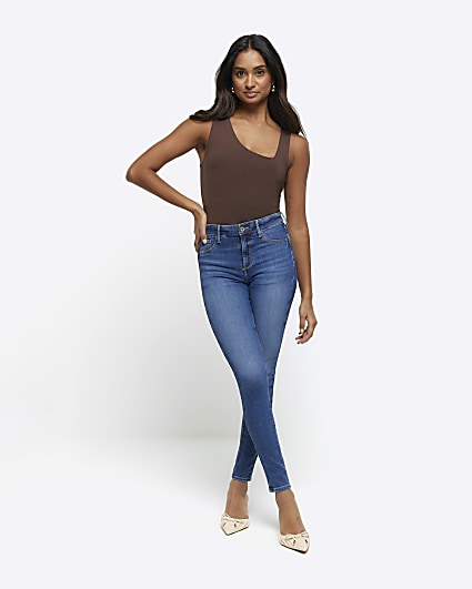 Blue mid rise bum sculpt skinny jeans