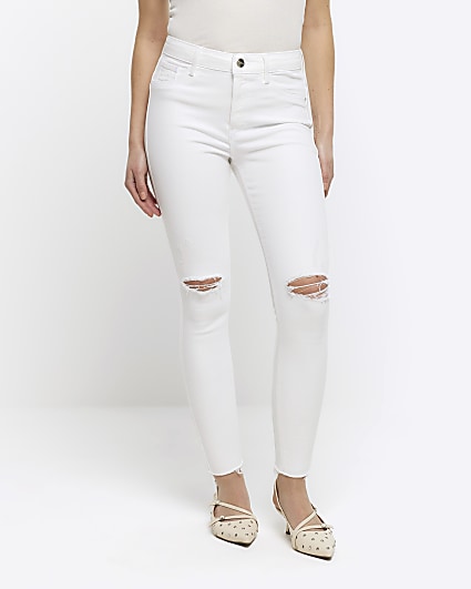 Petite white ripped Molly skinny jeans