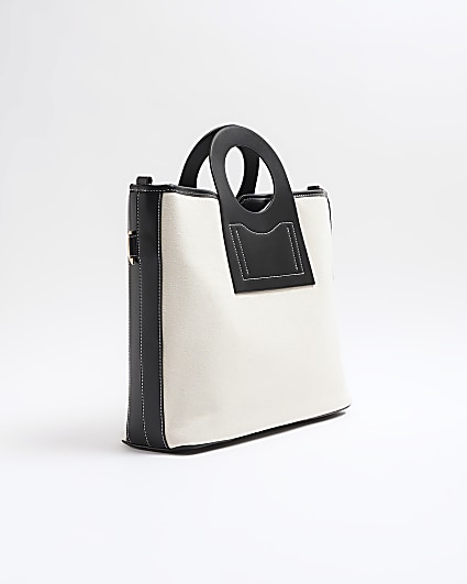 White and black canvas circle handle tote bag