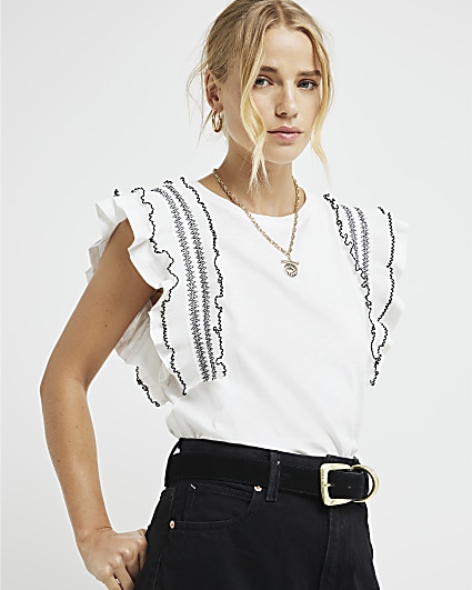 Cream frill stitched top