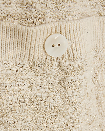 Cream knit oversized sleeveless cardigan