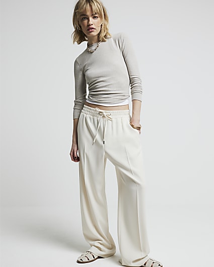 Cream wide leg jogger trousers