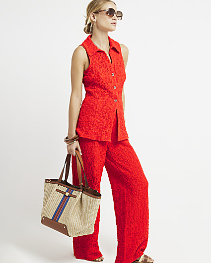 Red textured sleeveless shirt