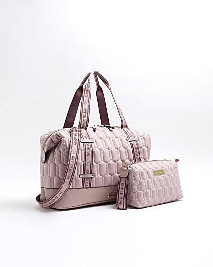 Pink quilted travel and makeup bag