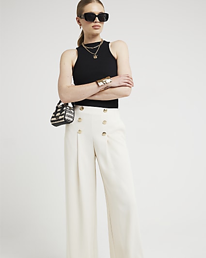Cream button front trousers