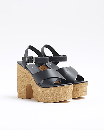 Black leather platform heeled sandals