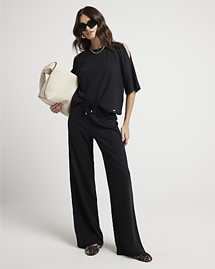 Black textured wide leg trousers