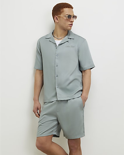 Blue Regular Fit Embroidered Script Shirt