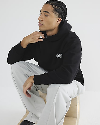 Black Oversized Essentialism Hoodie