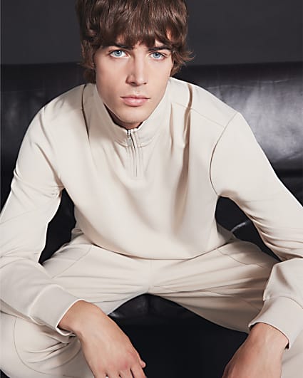 Beige slim fit textured half zip sweatshirt