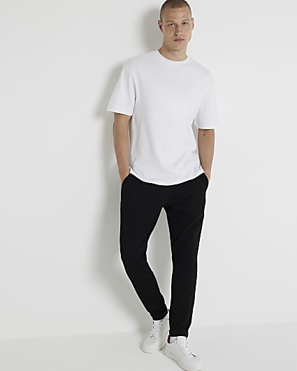 Black skinny fit textured turned hem joggers