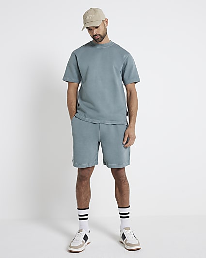 Washed green regular fit loopback shorts