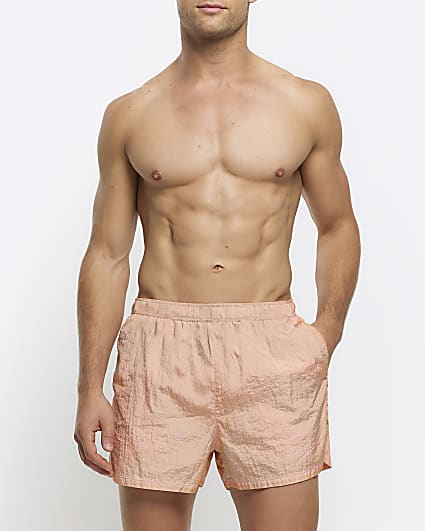 Pink elasticated swim shorts